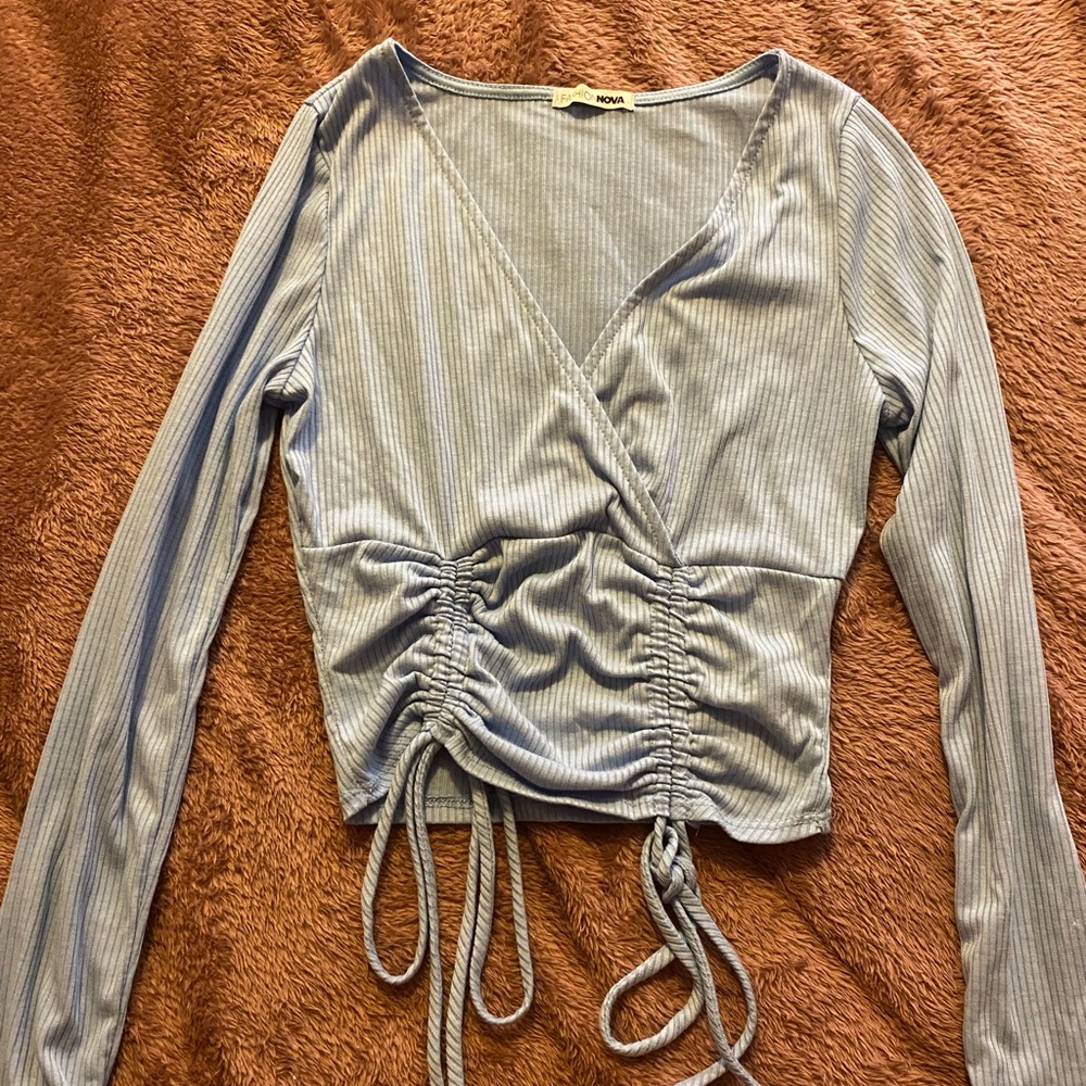 Long sleeve light weight baby blue shirt from fashion nova